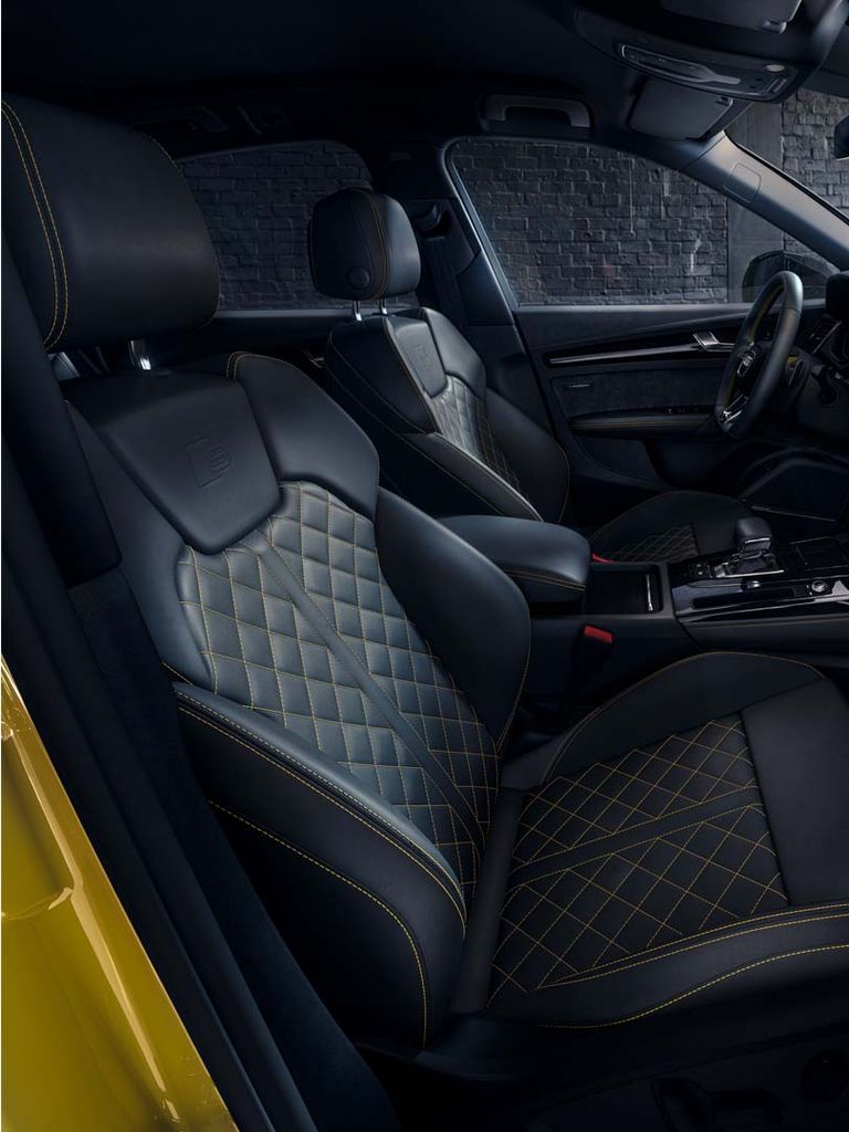 Interior view of the Q5 Sportback with yellow decorative stitching on the seats and details
